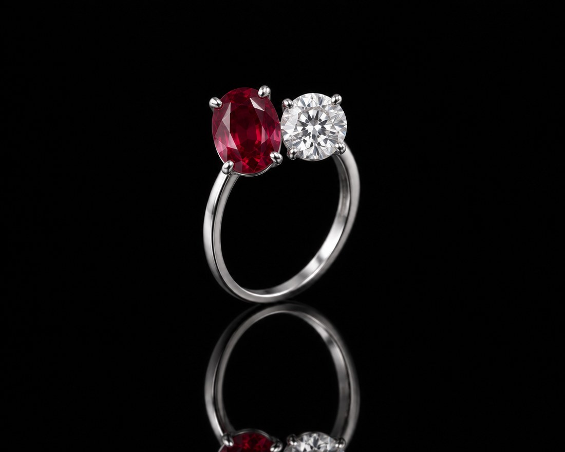 Toi et moi ring with an oval ruby and a round diamond in platinum